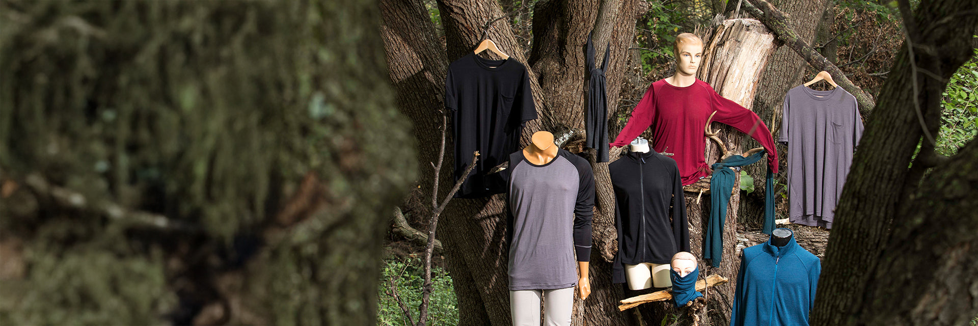 Surly wool riding wear on mannequins and hanging in trees 